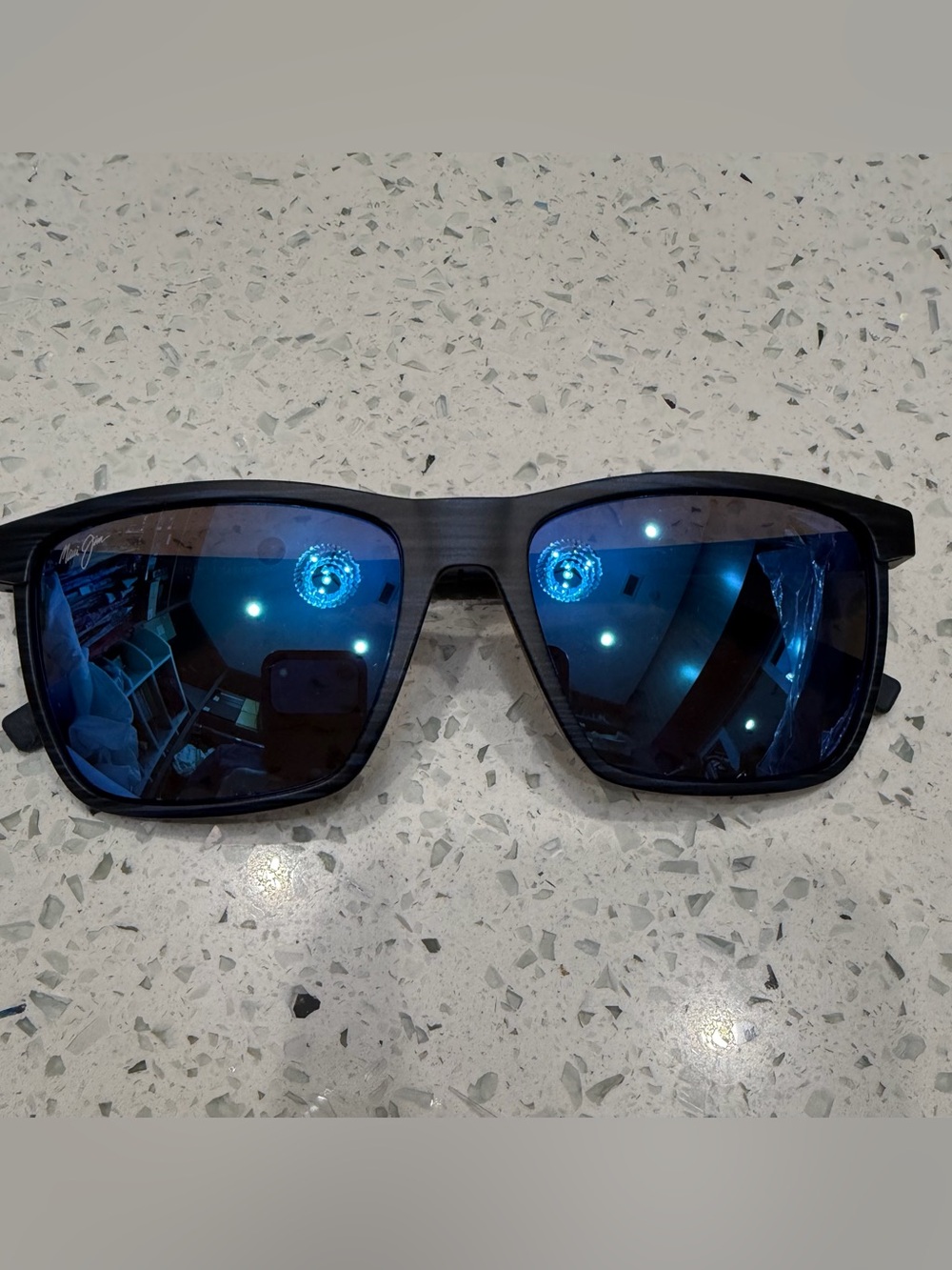 Maui Jim Black Frame Sunglasses with Blue Mirrored Lenses